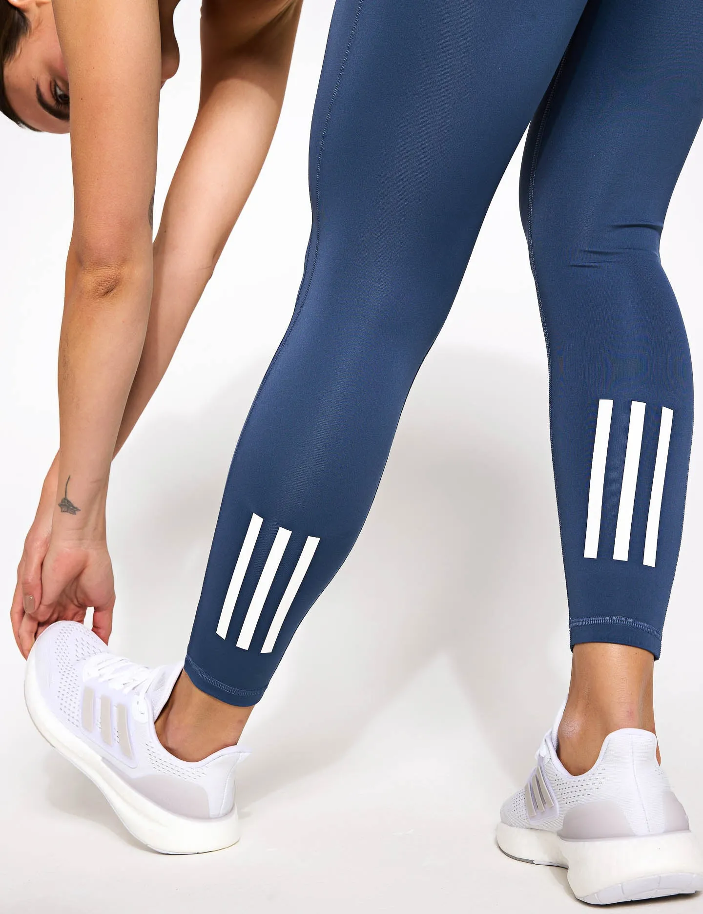 Own the Run 7/8 Leggings - Vorgelebte Tinte